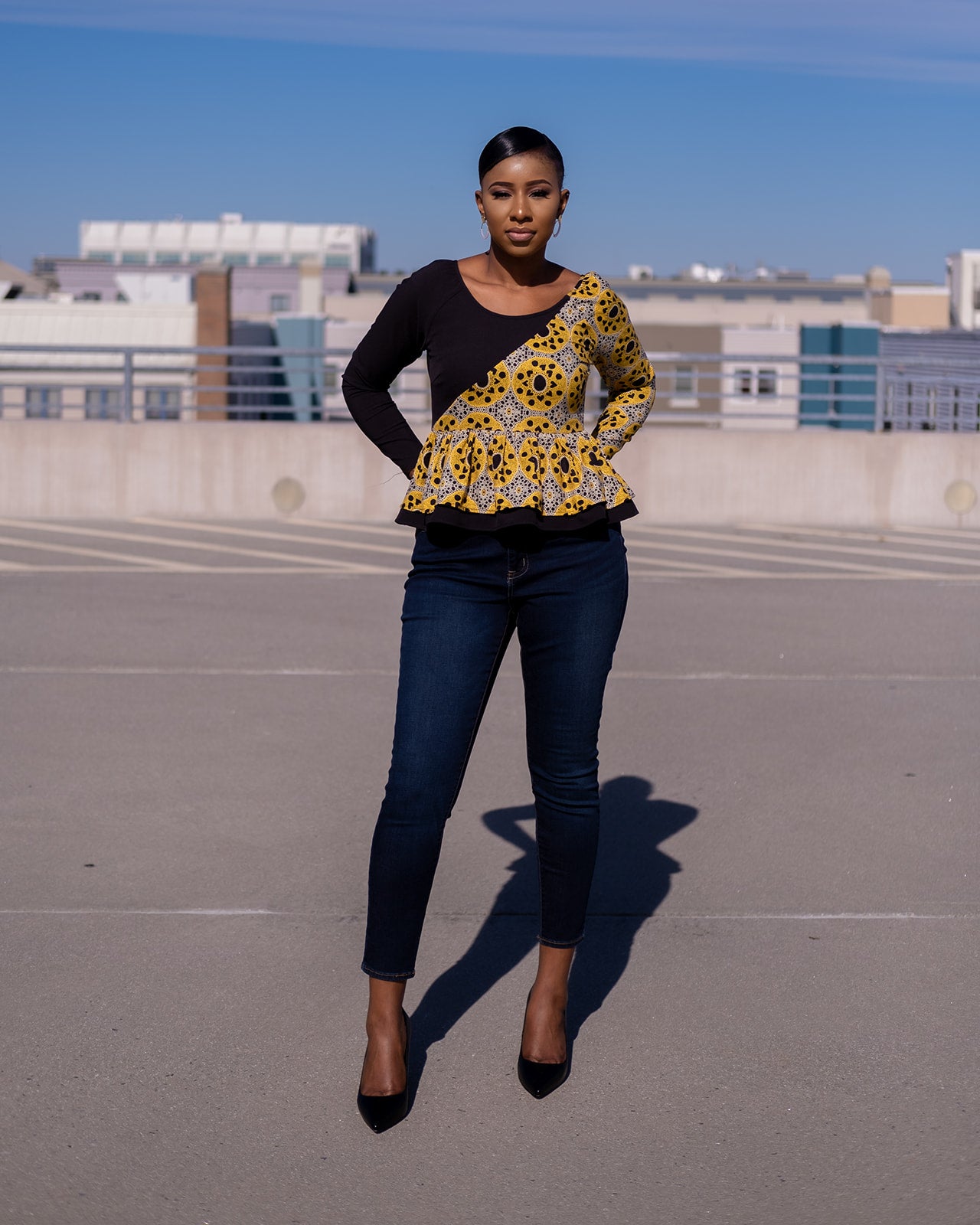 Dagit Peplum Top - Long sleeved with gold visible zippers